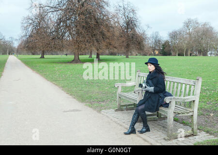 Korean girl with Hasselblad camera in Hyde Park, London, 2015 Stock Photo