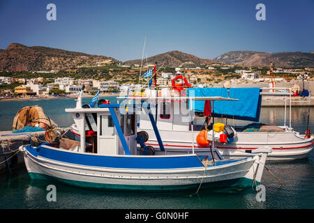 Image of small fishing boats in the village port. Makrigialos, Crete. Stock Photo