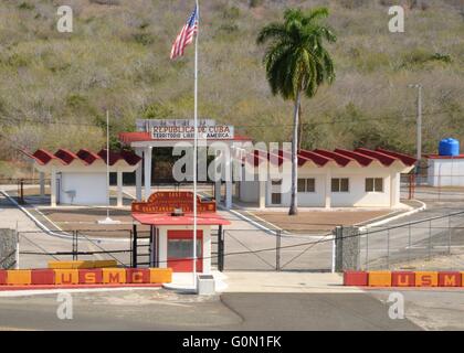 View of the Northeast Gate leading to Cuban territory from Naval Station Guantanamo Bay March 24, 2015 in Guantanamo Bay, Cuba. Naval Station Guantanamo Bay was established in 1903, making it the oldest overseas naval installation in operation. Stock Photo