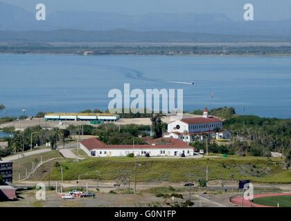 View of the chapel and Havana harbor seen from John Paul Jones Hill at Naval Station Guantanamo Bay December 15, 2015 in Guantanamo Bay, Cuba. Naval Station Guantanamo Bay was established in 1903, making it the oldest overseas naval installation in operation. Stock Photo