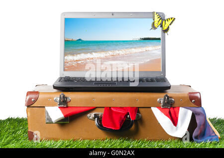 laptop on suitcase Stock Photo