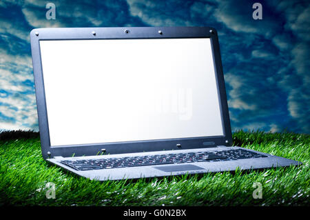 laptop on grass Stock Photo
