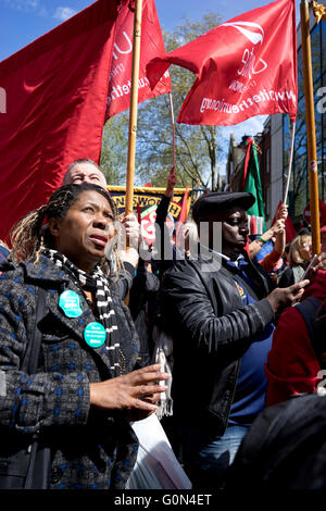 London,UK.1st May 2016. Demonstrators display banners and badges during International Workers May Day rally. Stock Photo