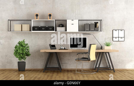 Contemporary home office with  laptop on minimalist desk - 3d rendering Stock Photo