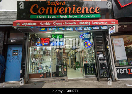 A convenience store in Williamsburg, Brooklyn in New York on Sunday, May 1, 2016 promotes its vaping and other merchandise. (© Richard B. Levine) Stock Photo