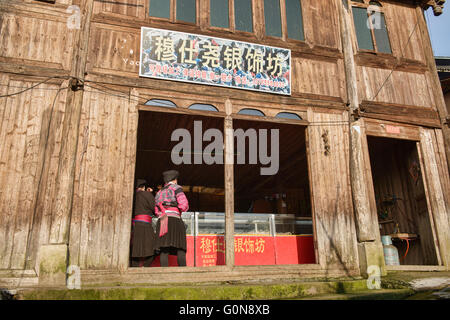 Yao women in the village shop, Dazhai, Guangxi Autonomous Region, China Stock Photo