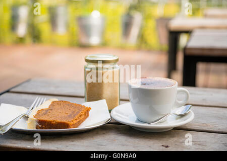 Coffee and cake in the garden Stock Photo