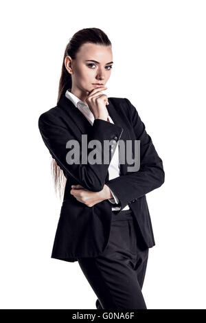 Portrait of young businesswoman in black suit isolated on white background Stock Photo