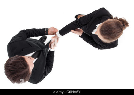 Top view of business man and woman shaking hands isolated on white background Stock Photo