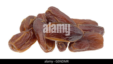 A group of Tunisian pitted dates isolated on a white background. Stock Photo