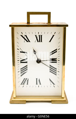 Golden alarm clock isolated on white Stock Photo