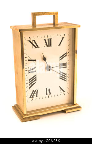 Golden alarm clock isolated on white Stock Photo