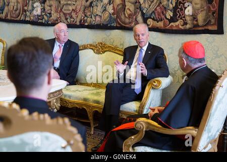 U.S Vice President Joe Biden meets with Cardinal Pietro Parolin, Vatican Secretary of State, as U.S. Ambassador Kenneth Hackett looks on at the Apostolic Palace April 29, 2016 in Vatican City. Biden is at the Vatican to speak at the International Conference on Regenerative Medicine. Stock Photo