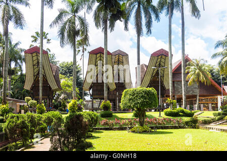 Traditional indonesian houses in Taman Mini Park Stock Photo