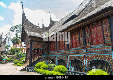 Traditional indonesian houses in Taman Mini Park Stock Photo