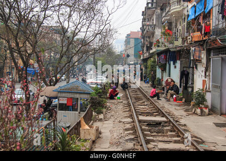 Hanoi, Vietnam - February 19, 2016: Old houses built next to the railway in the center of Hanoi Stock Photo