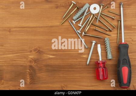 Set of tools and instruments on wooden background. Different kinds of tools for household chores. Home repairs. Father's Day. Stock Photo