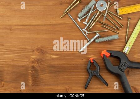 Set of tools and instruments on wooden background. Different kinds of tools for household chores. Home repairs. Father's Day. Stock Photo