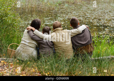 Family of four picking Stock Photo