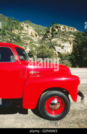 BRIGHT CHERRY RED 1950 CHEVROLET PICK UP TRUCK; OAK CREEK CANYON; SEDONA; ARIZONA; USA Stock Photo