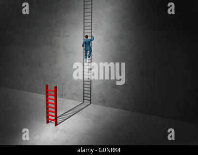 Business success imagination concept as a businessman climbing the long upward cast shadow of a small ladder. Stock Photo