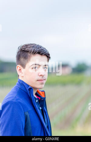 close up of young boy in countryside Stock Photo