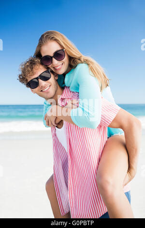 Happy couple posing on the beach Stock Photo