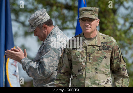 Stuttgart, Germany. 03rd May, 2016. US Army General Curtis Scaparrotti (R), new commanding officer of US and NATO troups in Europe, standing on stage, with his predecessor US Air Force General Philip Breedlove (L) applauding behind him, during the change in command at the United States European Command (EUCOM), in Stuttgart, Germany, 03 May 2016. Photo: MARIJAN MURAT/dpa/Alamy Live News Stock Photo