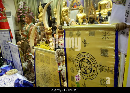 Bangkok, Thailand. 3rd May, 2016. Sacred holy unbeatable Leicester City fabric and talismanat Wat Traimit temple in Bangkok. The Thai Buddhist monk became famous and well known as a magic monk as he is credited to be a part of Leicester City's success after he traveled several times to King Power Stadium in England. Credit:  Piti A Sahakorn/Alamy Live News Stock Photo