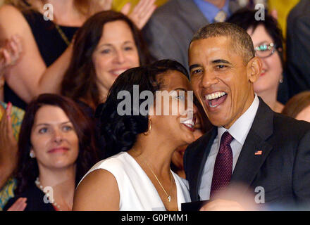 Washington, DC, USA. 3rd May, 2016. U.S. President Barack Obama (R) hosts the 2016 National Teacher of the Year Jahana Hayes (L) during a ceremony in the East Room of the White House in Washington, DC, the United States, May 3, 2016. Credit:  Yin Bogu/Xinhua/Alamy Live News Stock Photo