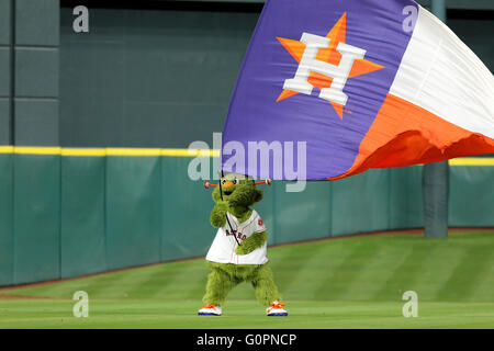 Houston Astros mascot , Orbit, waves to fans before a spring