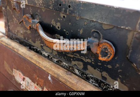 handle detail on old leather suitcase Stock Photo