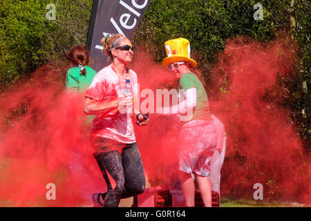 Runners taking part in a charity colour run at the University of Central Lancashire in Preston Stock Photo