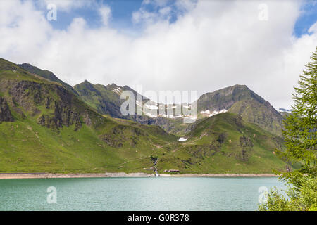 Stunning view of the lake of Ritom with the alps in background, Piora, Canton Ticino of Switzerland. Stock Photo
