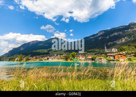 Stunning view of the small town Lungern on the lake side of Lungernsee on Bernese Oberland of Switzerland. This town lies on the Stock Photo