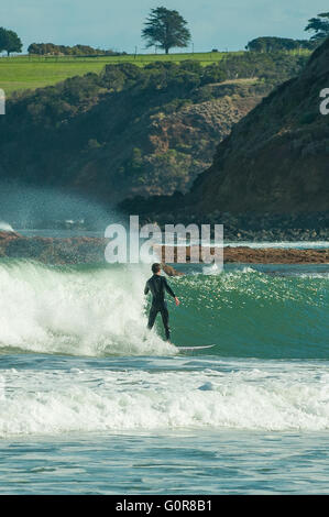 Surfer at Smiths Beach, Phillip Island, Victoria, Australia Stock Photo