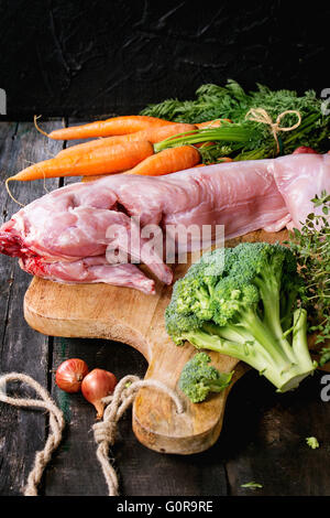 Raw rabbit with vegetables Stock Photo