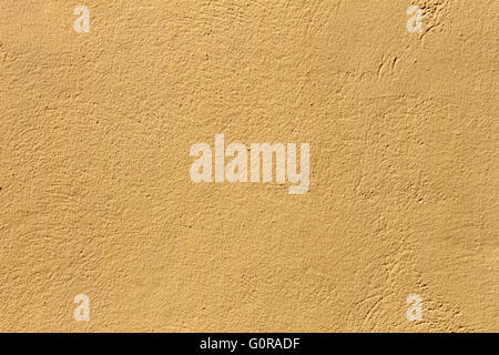 Abstract textured yellow stone background. Stock Photo