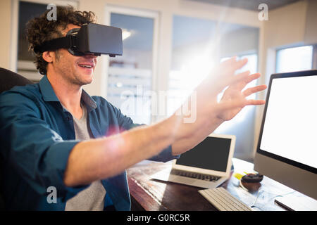 Businessman wearing virtual glasses Stock Photo