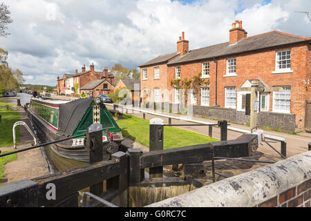 Narrowboats at Fradley Junction lock on the Trent and Mersey Canal, Staffordshire, England, UK Stock Photo