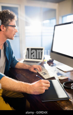 Businessman using a graphic pad Stock Photo