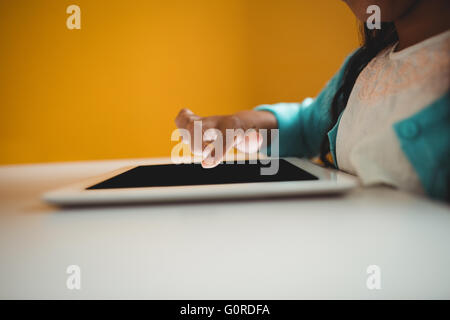 Close up of girl using a tablet Stock Photo