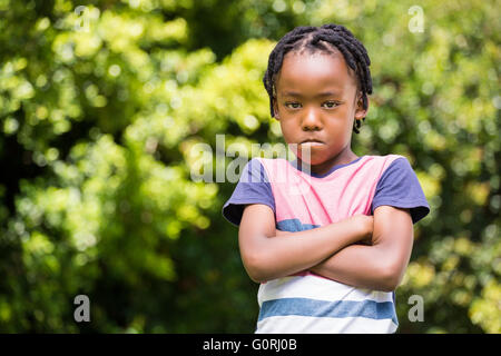 Angry boy with arms crossed Stock Photo