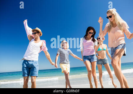 Friends  dancing on the beach Stock Photo