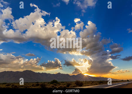 Sunset behind the Sierra Estrella Mountains in the desert south of Phoenix, Arizona, USA Stock Photo
