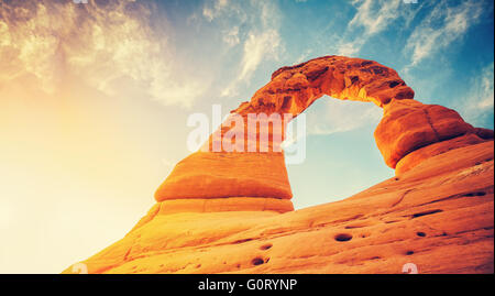 Vintage toned Delicate Arch at sunset, Arches National Park in Utah, USA. Stock Photo