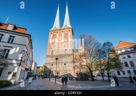 View of Nikolaikirche, Nikolai Church, in historic Nikolaiviertel district in Mitte Berlin Germany Stock Photo