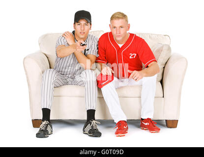 Isolated on white series of two men in baseball uniforms, in various poses with props. Stock Photo