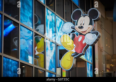 New York times Square   Disney store exterior Mickey Mouse logo sign Stock Photo