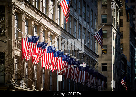 New york   many lots large amount rows flags stars stripes hanging exterior of building flying The flag of the United States of Stock Photo